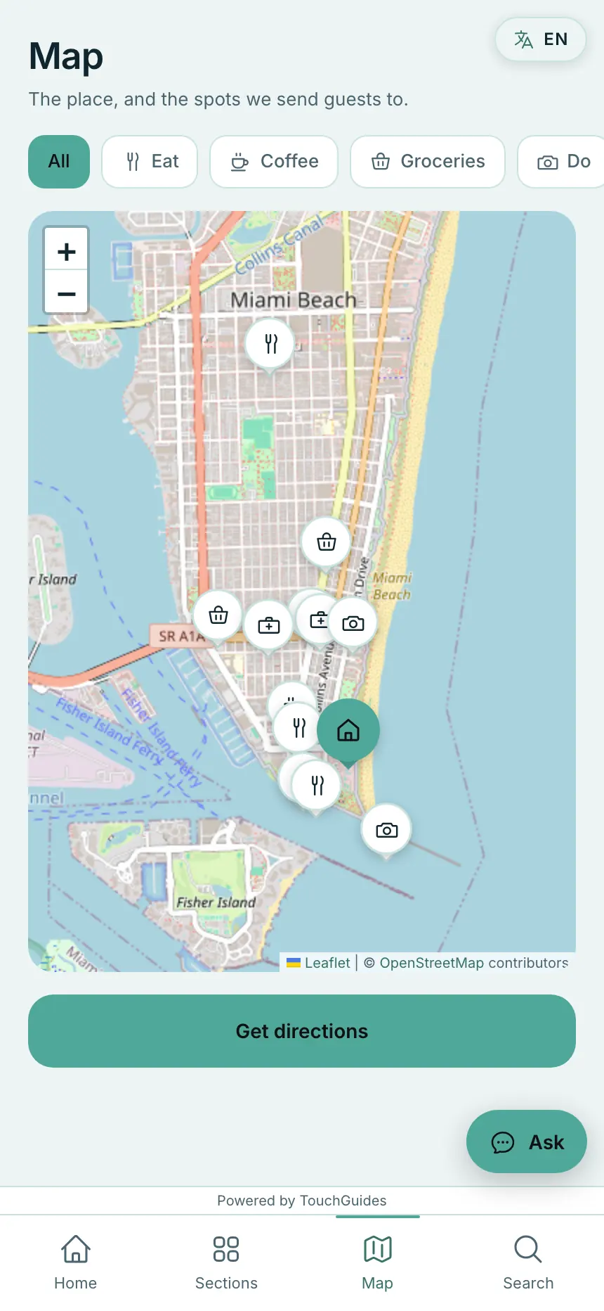 The property pinned on a map among the host's recommendations, with category filters above it and a directions button under it